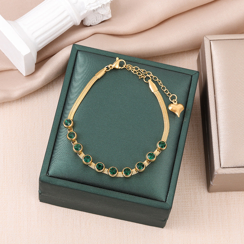Elegant Emerald Gold Bracelet