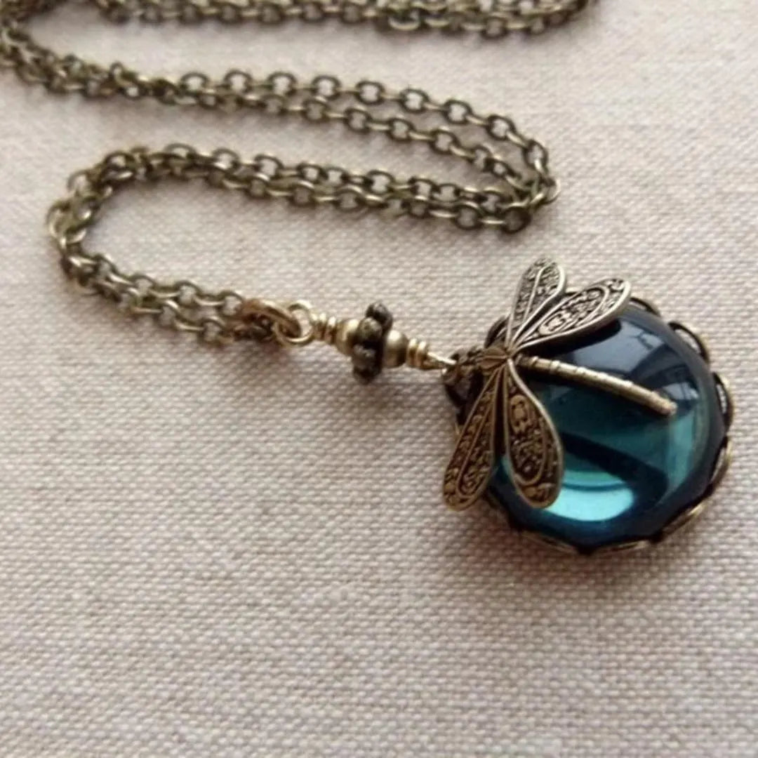 Blue Crystal Dragonfly Necklace In Antique Gold