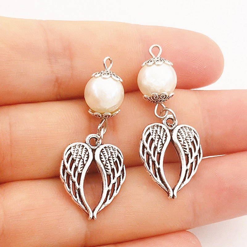 Pearl Wing Drop Earrings