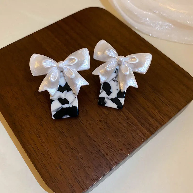 Pearlescent Bow Earrings