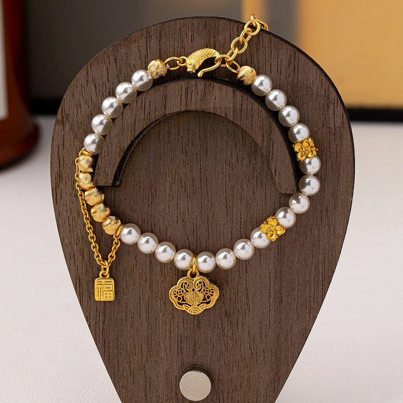 Elegant Pearl Charm Bracelet