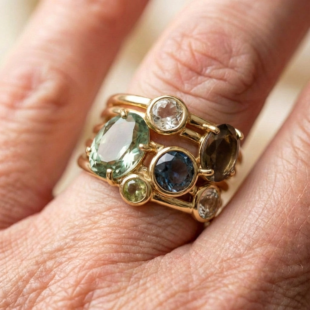 An Elegant Oval & Round Cut Multi Gemstone Ring