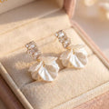 Elegant Gold Petal Earrings In White
