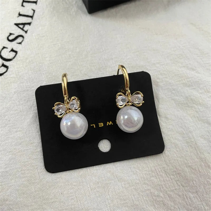 Elegant Pearl Bow Earrings