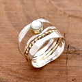 Elegant Gold Spinner Pearl Ring