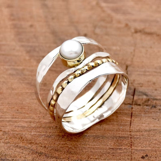 Elegant Gold Spinner Pearl Ring