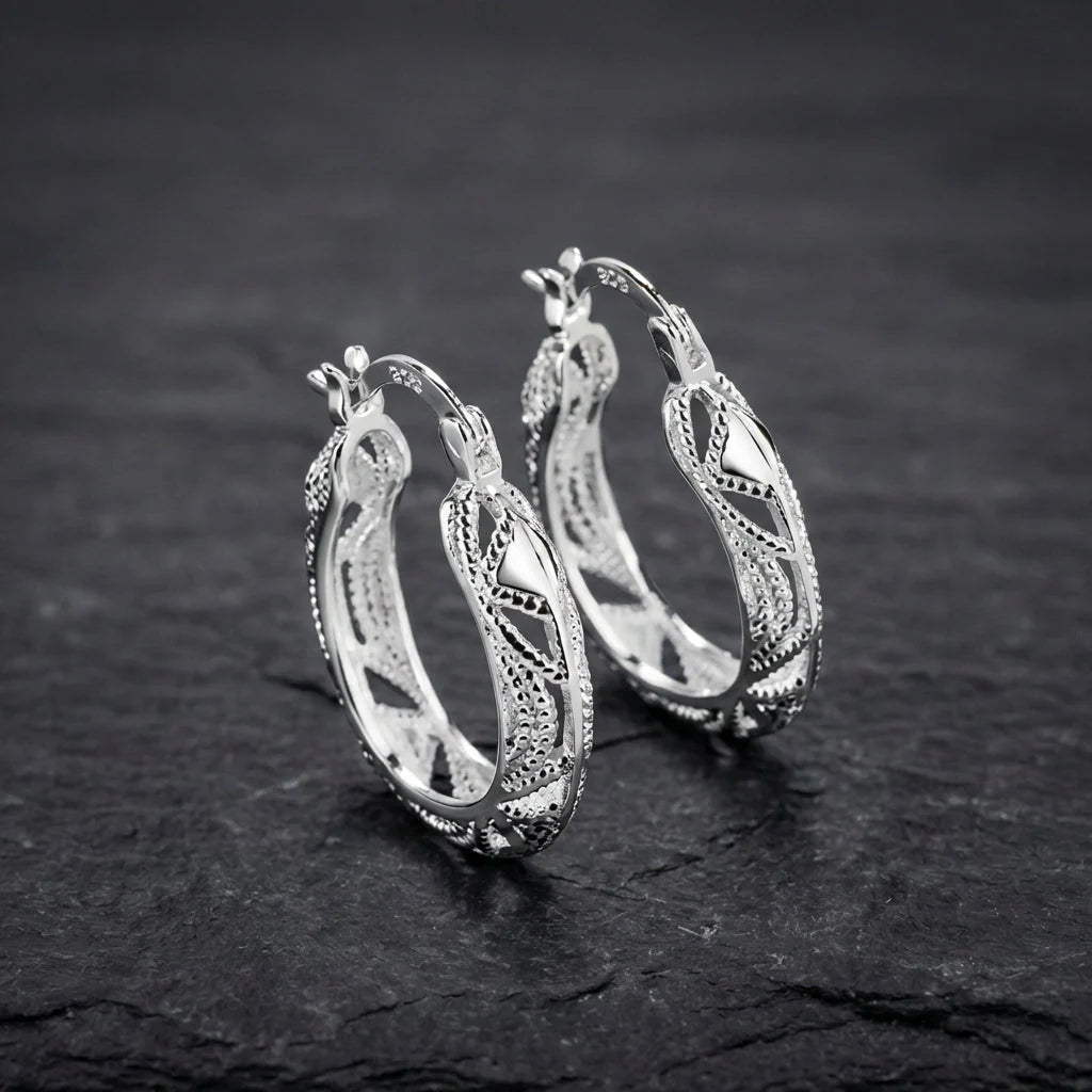 Elegant Carved Silver Earrings