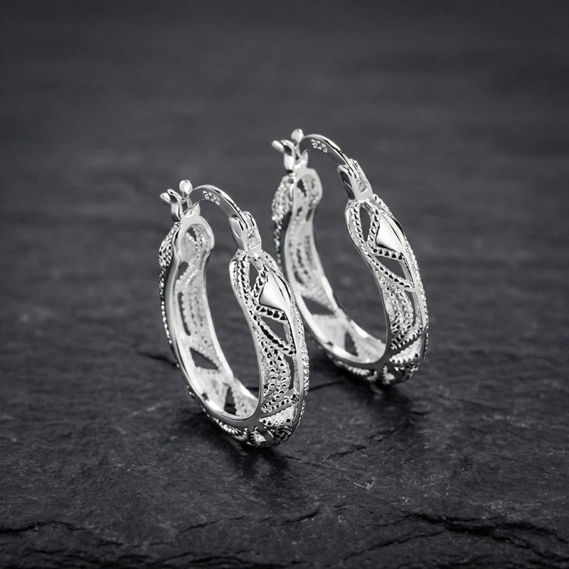 Elegant Carved Silver Earrings