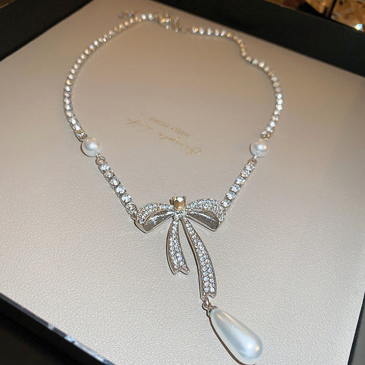 Elegant Pearl Bow Necklace