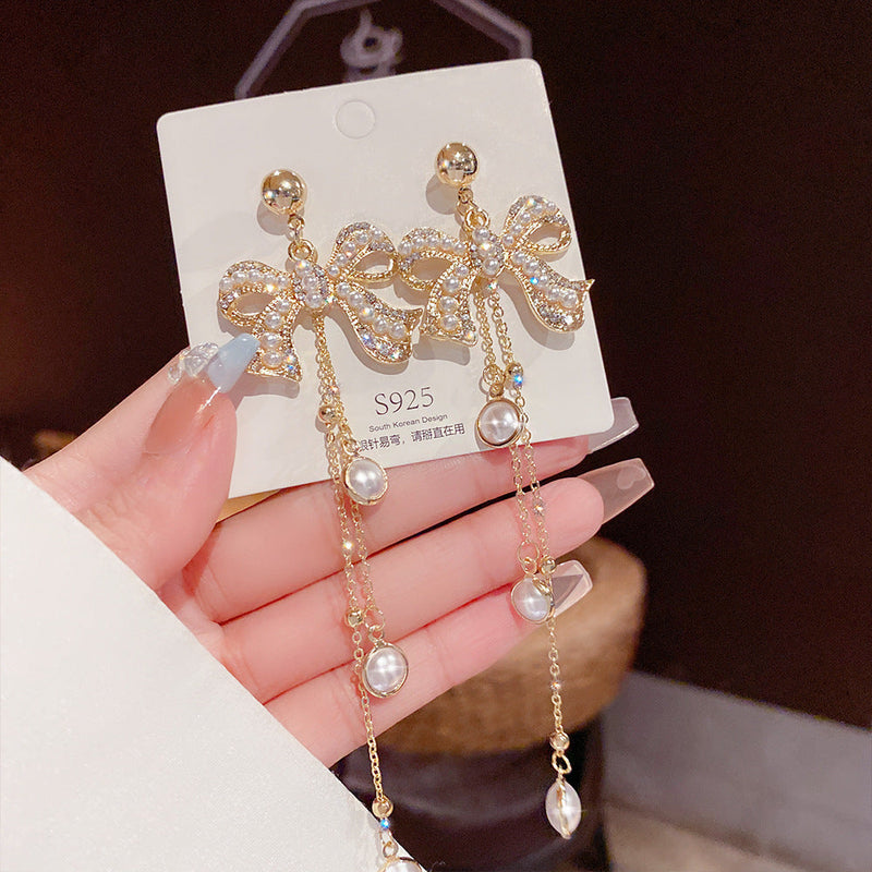 Elegant Pearl Bow Earrings