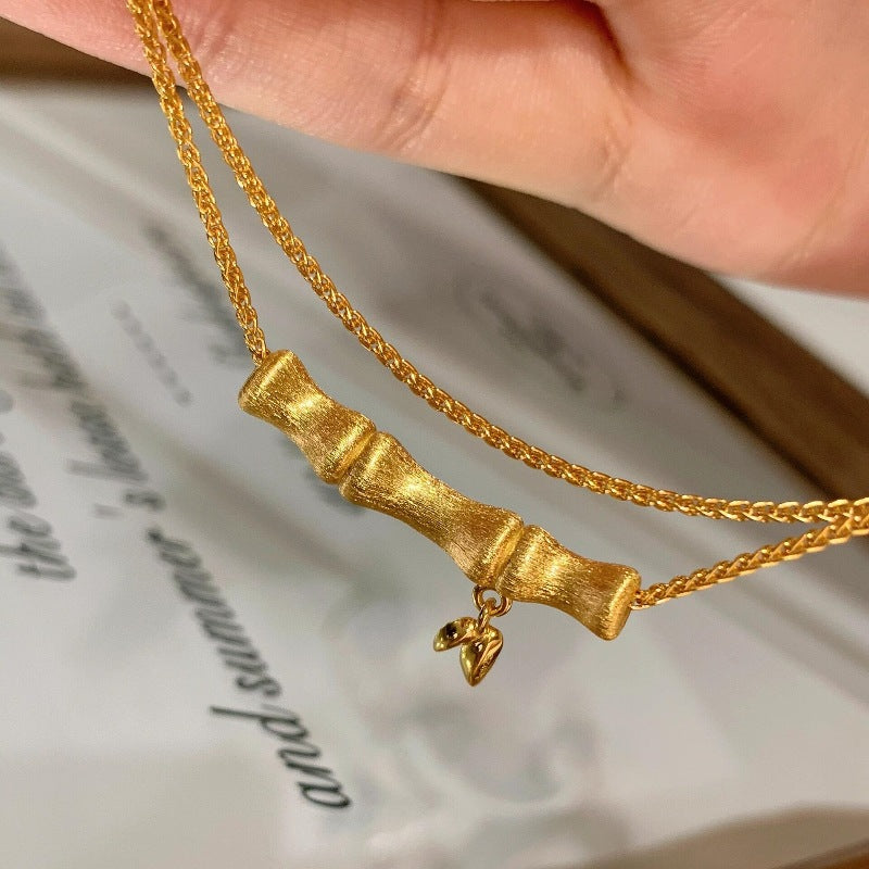 Elegant Gold Bow Necklace