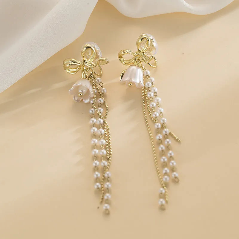 Elegant Pearl Bow Earrings