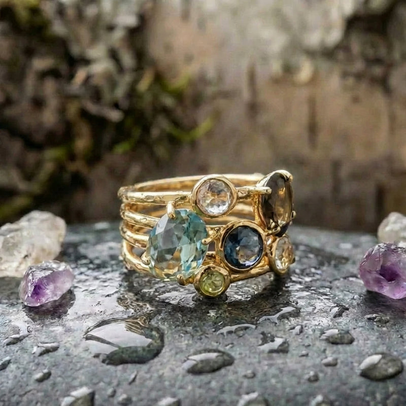 An Elegant Oval & Round Cut Multi Gemstone Ring