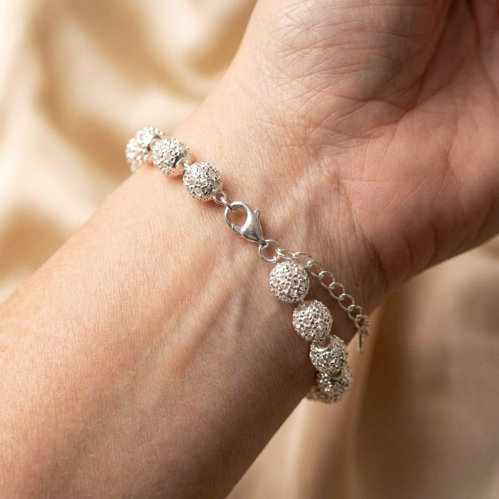 Silver Hollow Lantern Ball Charm Bracelet