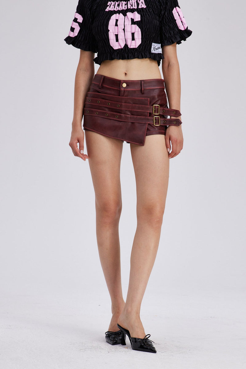 Charline Buckle Asymmetric Leather Skirt
