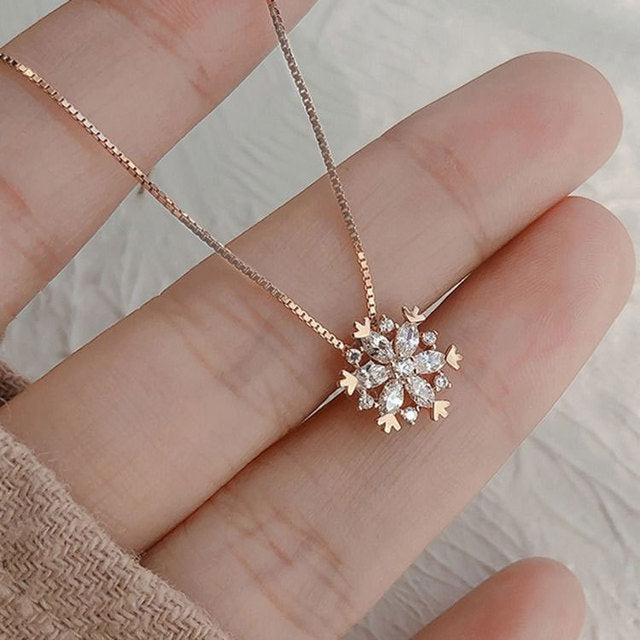 Glittering Snowflake Crystal Necklace In Gold And Silver