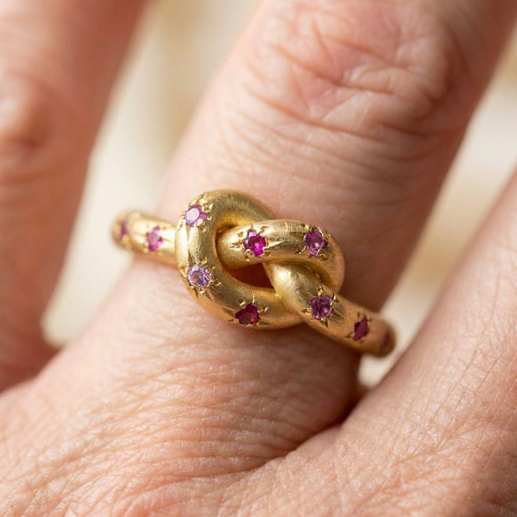 A Vintage Pink Knotted Celestial Gold Ring