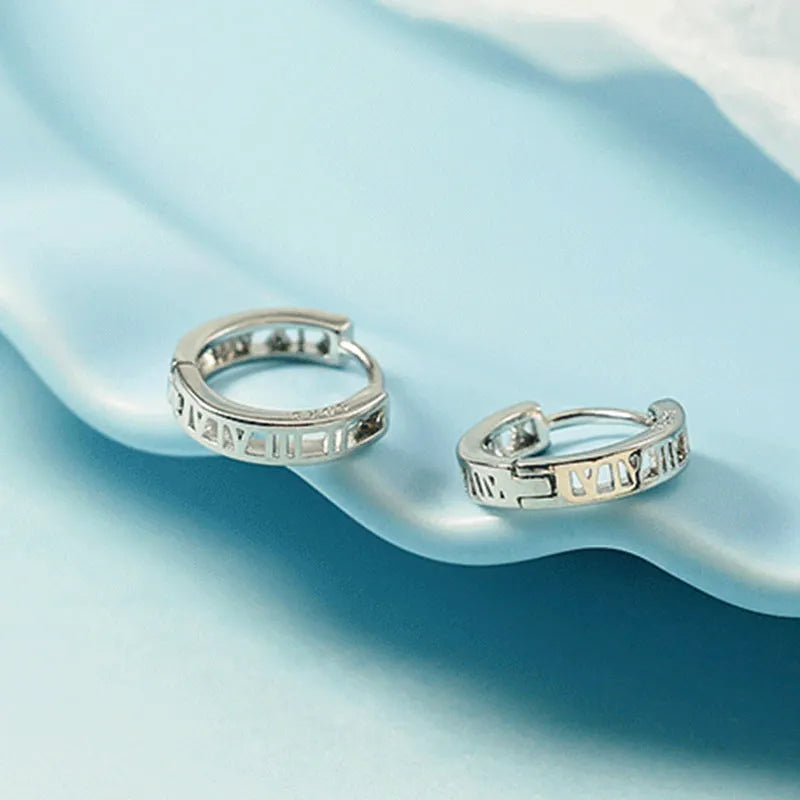 Classic Silver Huggie Earrings
