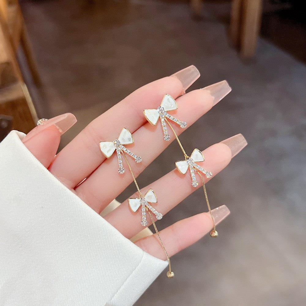 Elegant Pearl Bow Earrings