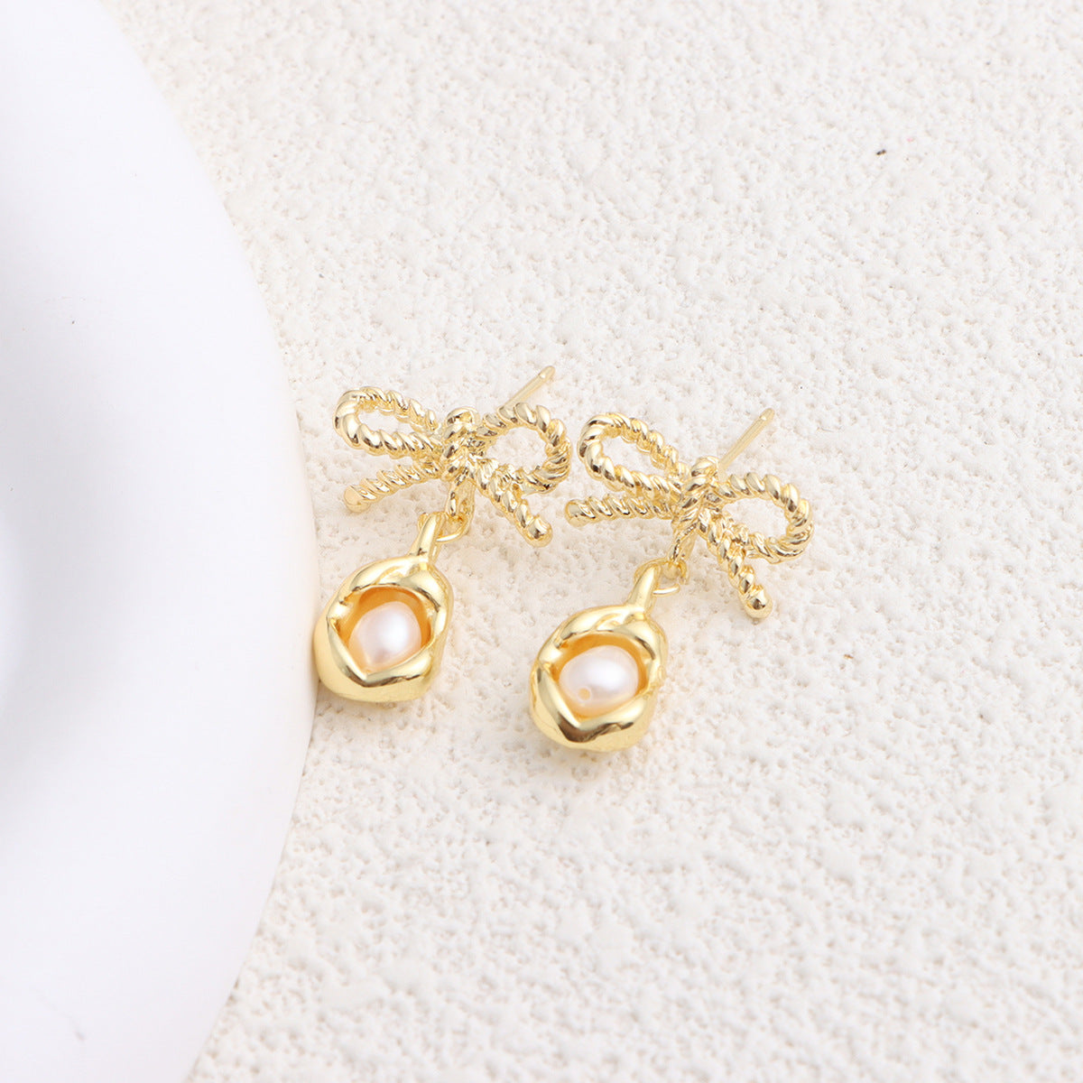 Elegant Pearl Bow Earrings