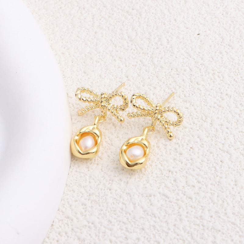 Elegant Pearl Bow Earrings