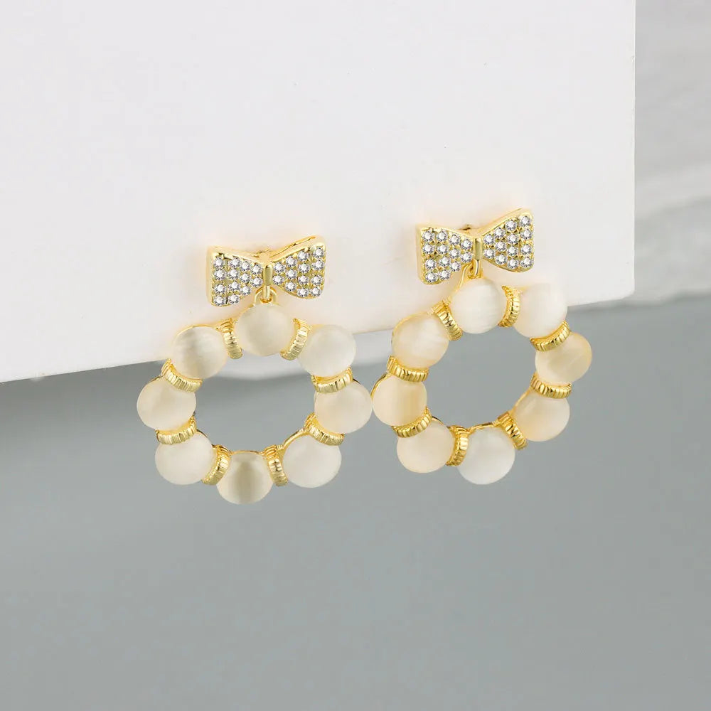 Elegant Pearl Bow Earrings